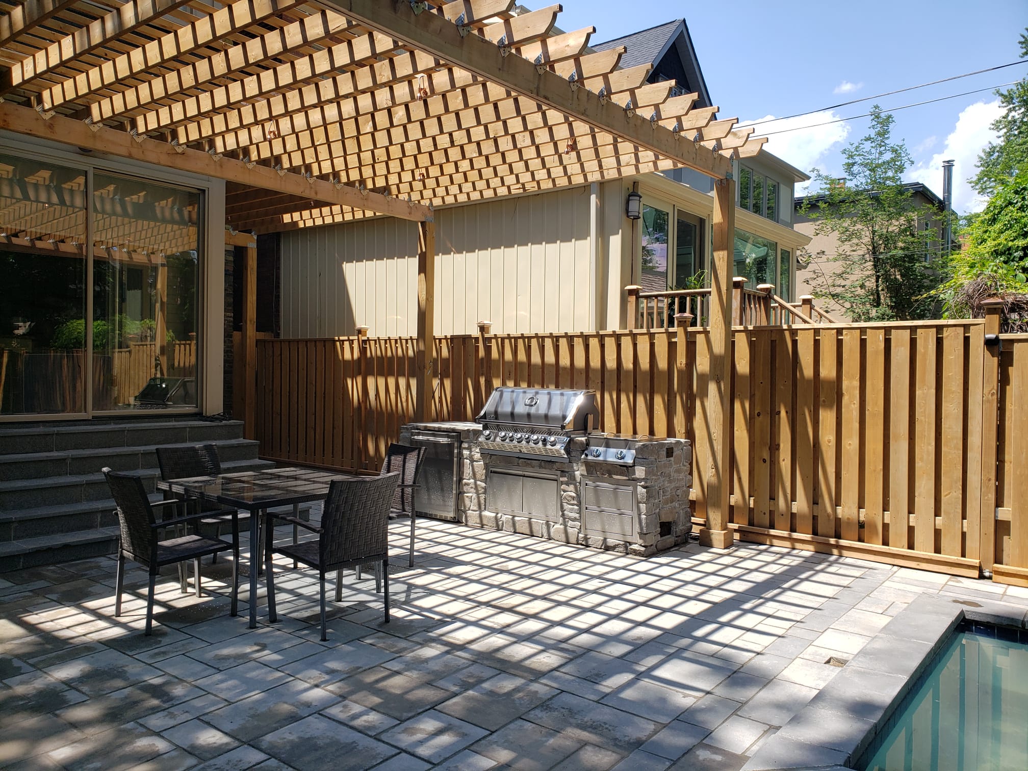 fence and deck and outdoor kitchen