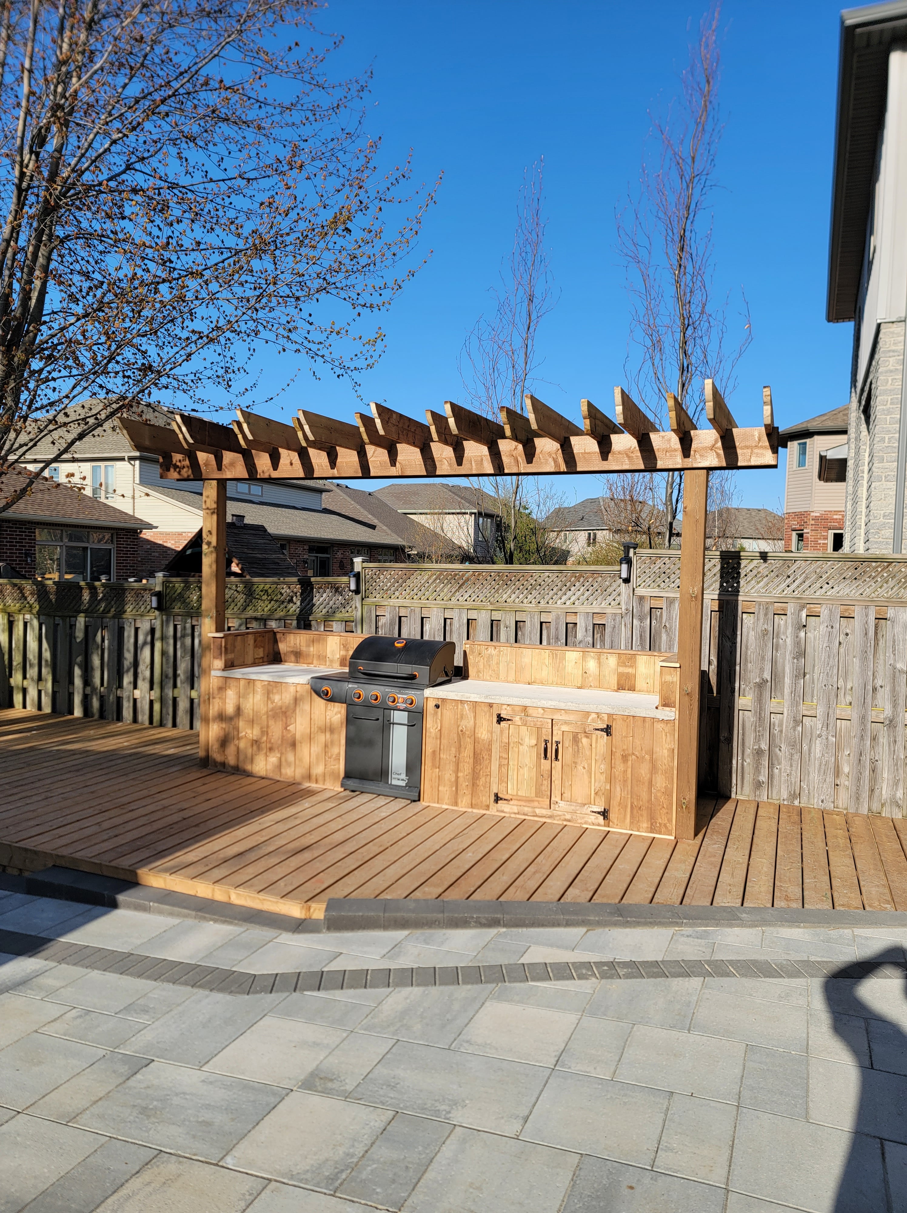Spacious outdoor kitchen with multiple cooking stations